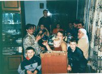 Большая семья за новогодним столом 2001-2002гг.бабушка сидит справа